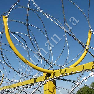 Holders for installation of barbed wire